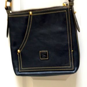 Dooney and Bourke blue jeans cross body bag.